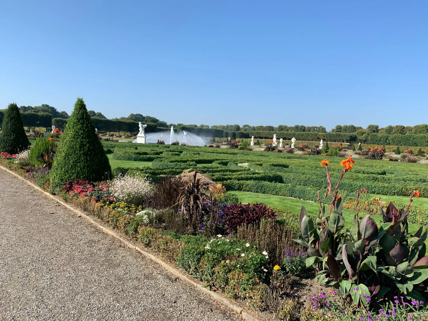 Formal flower beds in a broad garden
