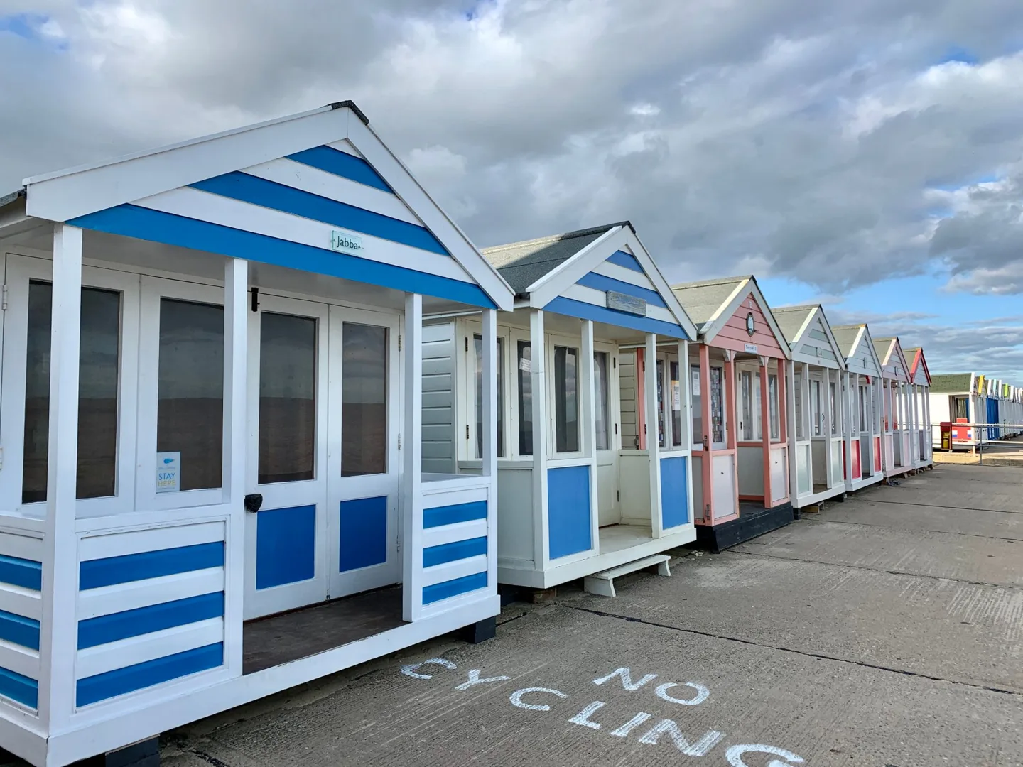 Row of colorful beach huts