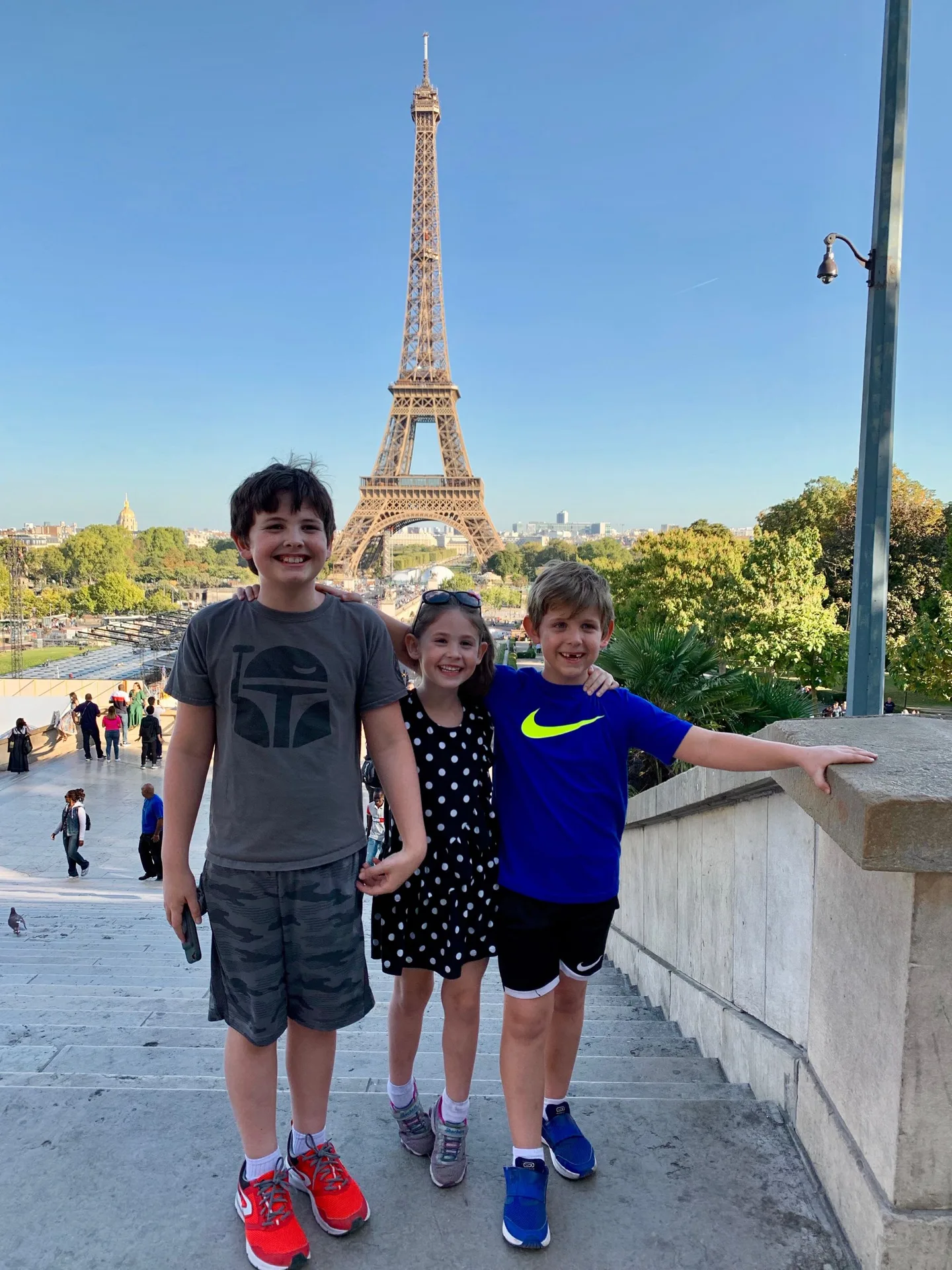 Children beside the fountains near the Eiffel Tower
