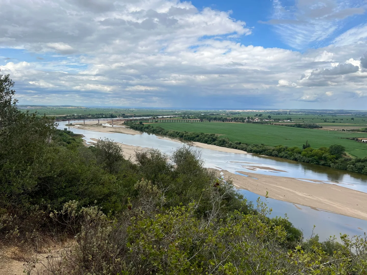 River winding past fields below Santarém