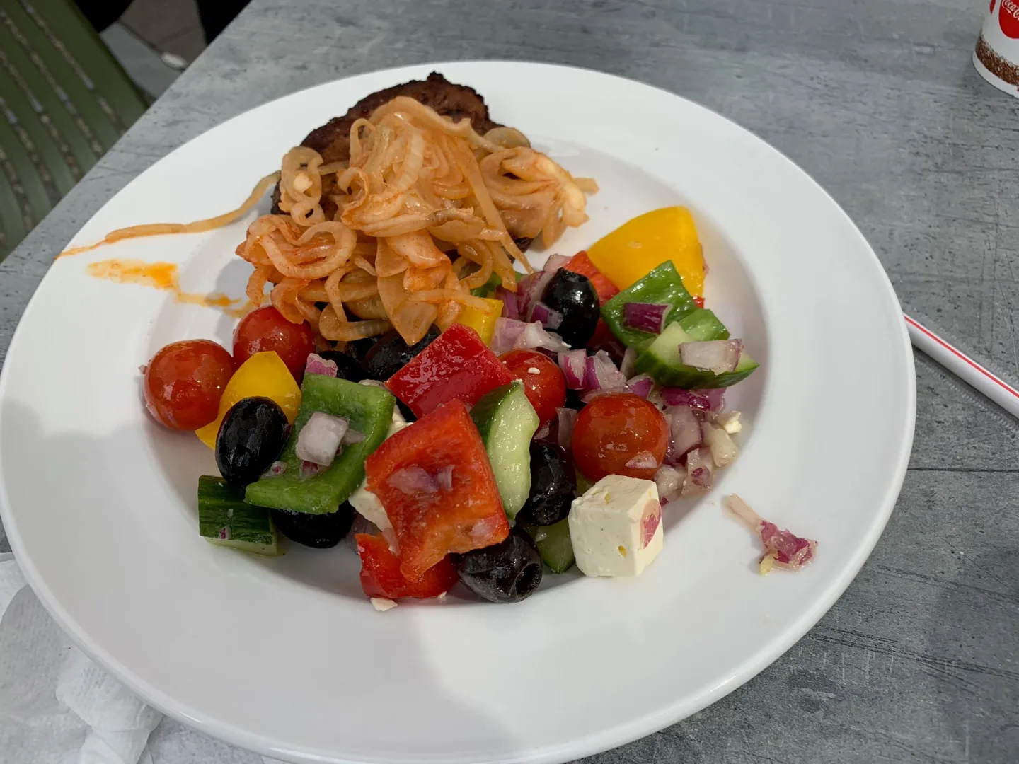 Pasta and mixed salad on a plate