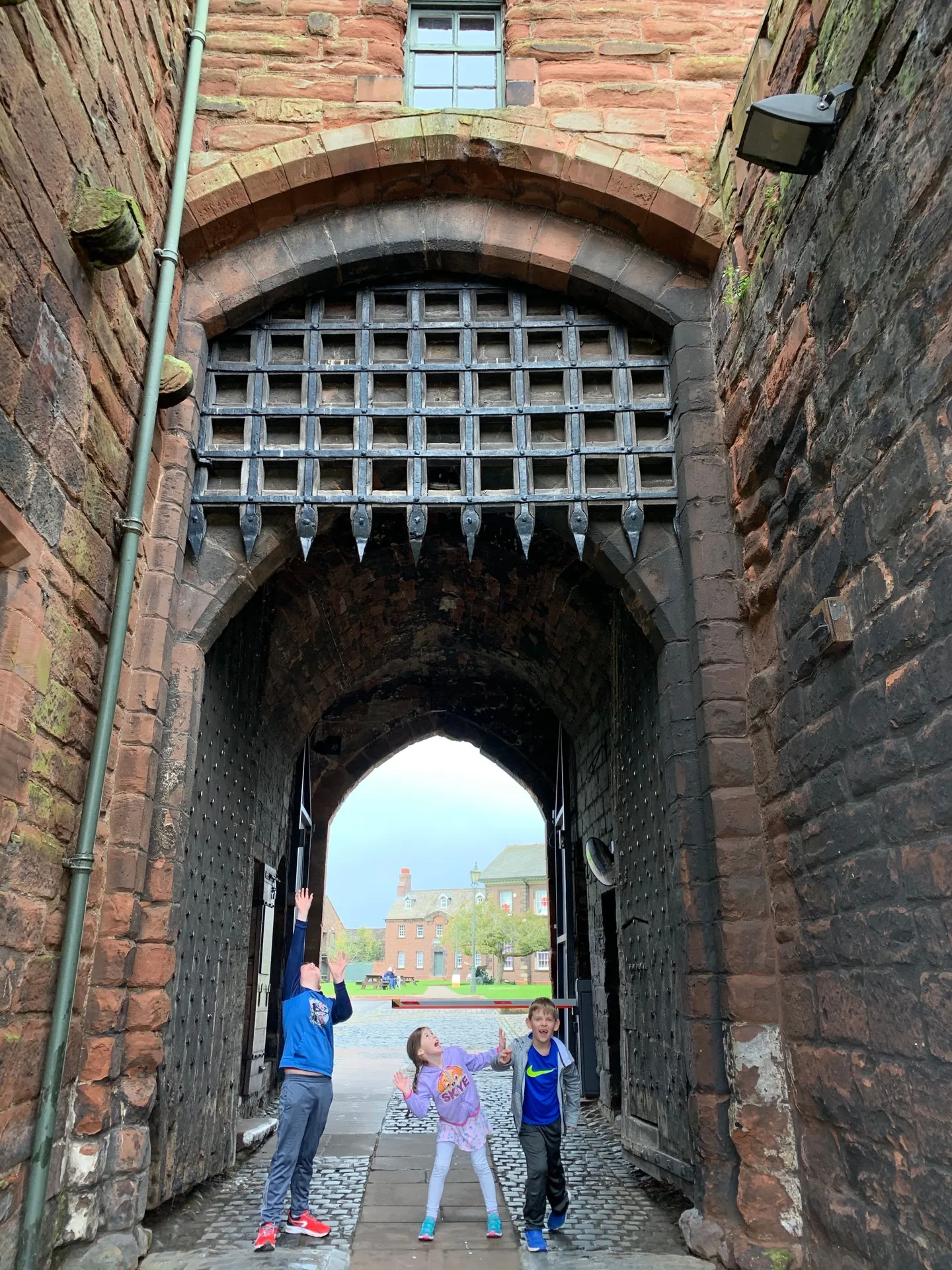 Children beneath the castle gate