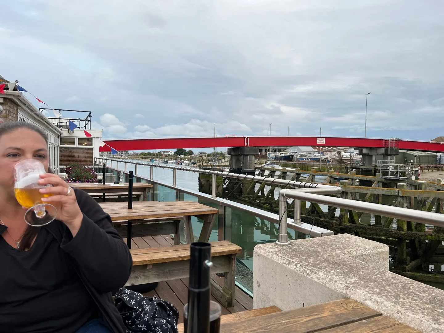 Drink on an outdoor terrace beside the water
