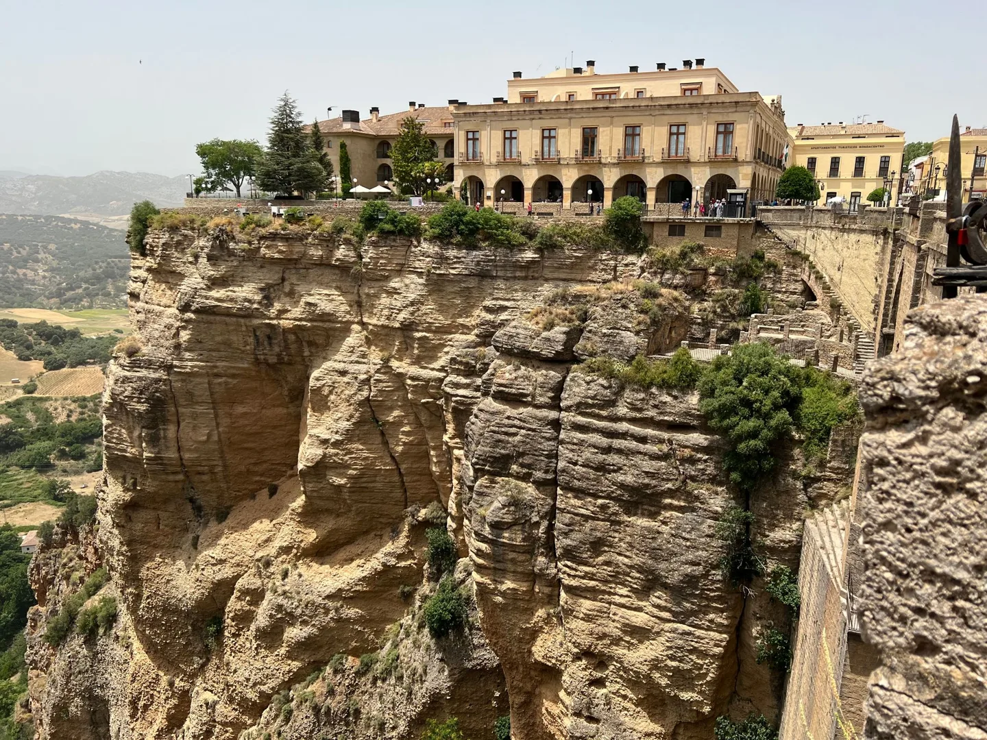 Large building on a sheer cliff above the gorge