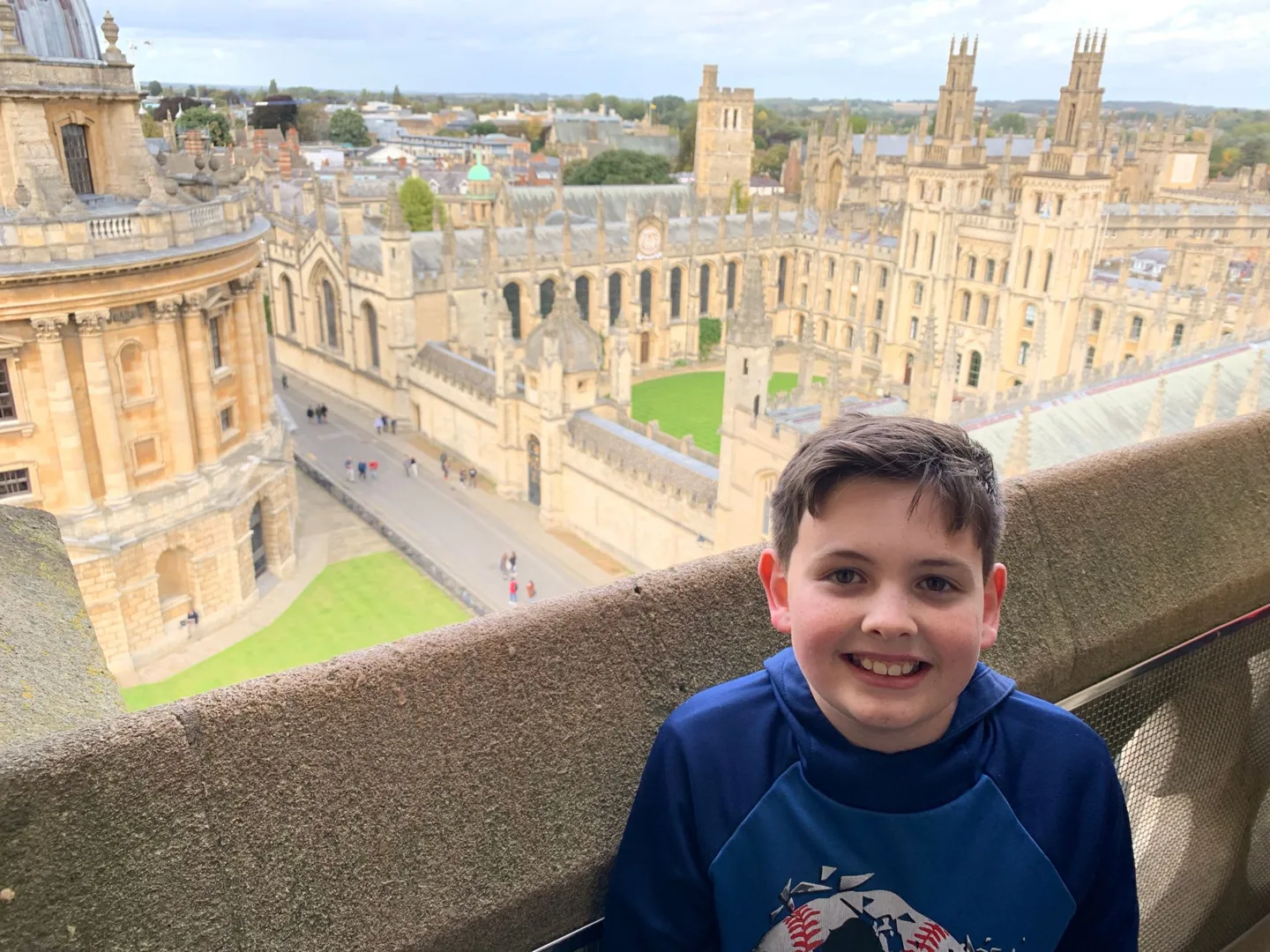 Child at a tower viewpoint above Oxford
