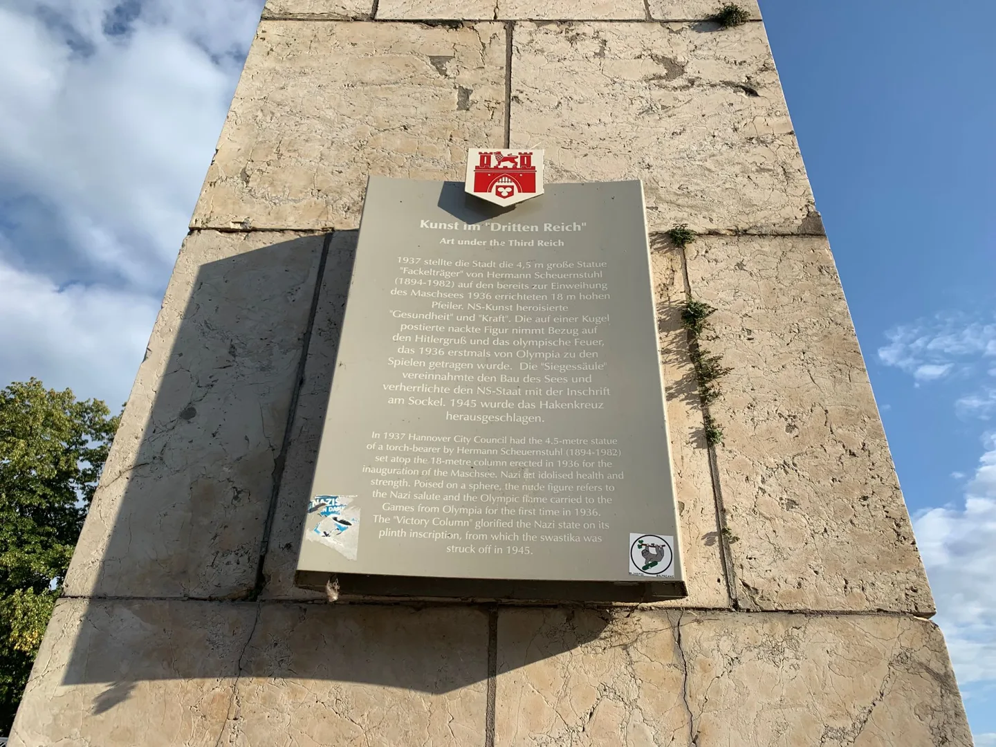 Plaque mounted on a stone monument