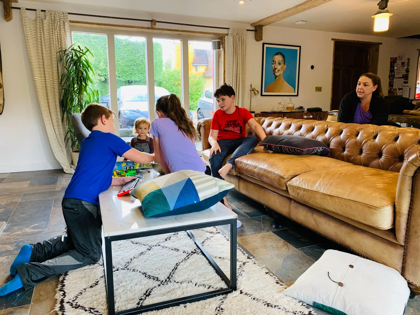 Family gathered in a living room