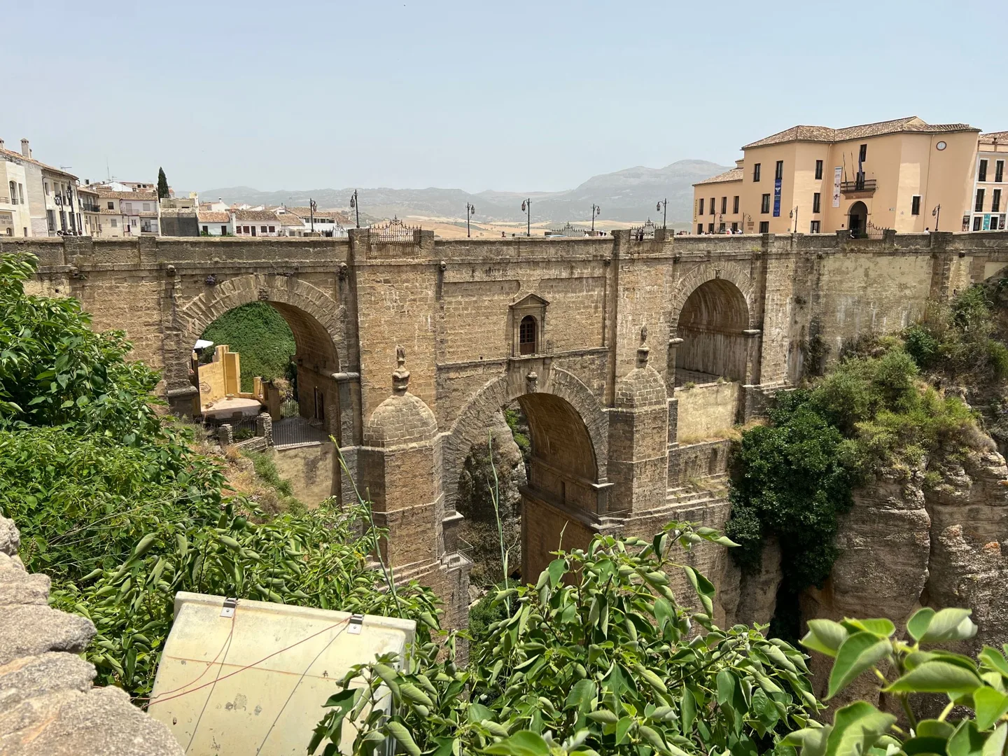 Stone bridge spanning Ronda's deep gorge