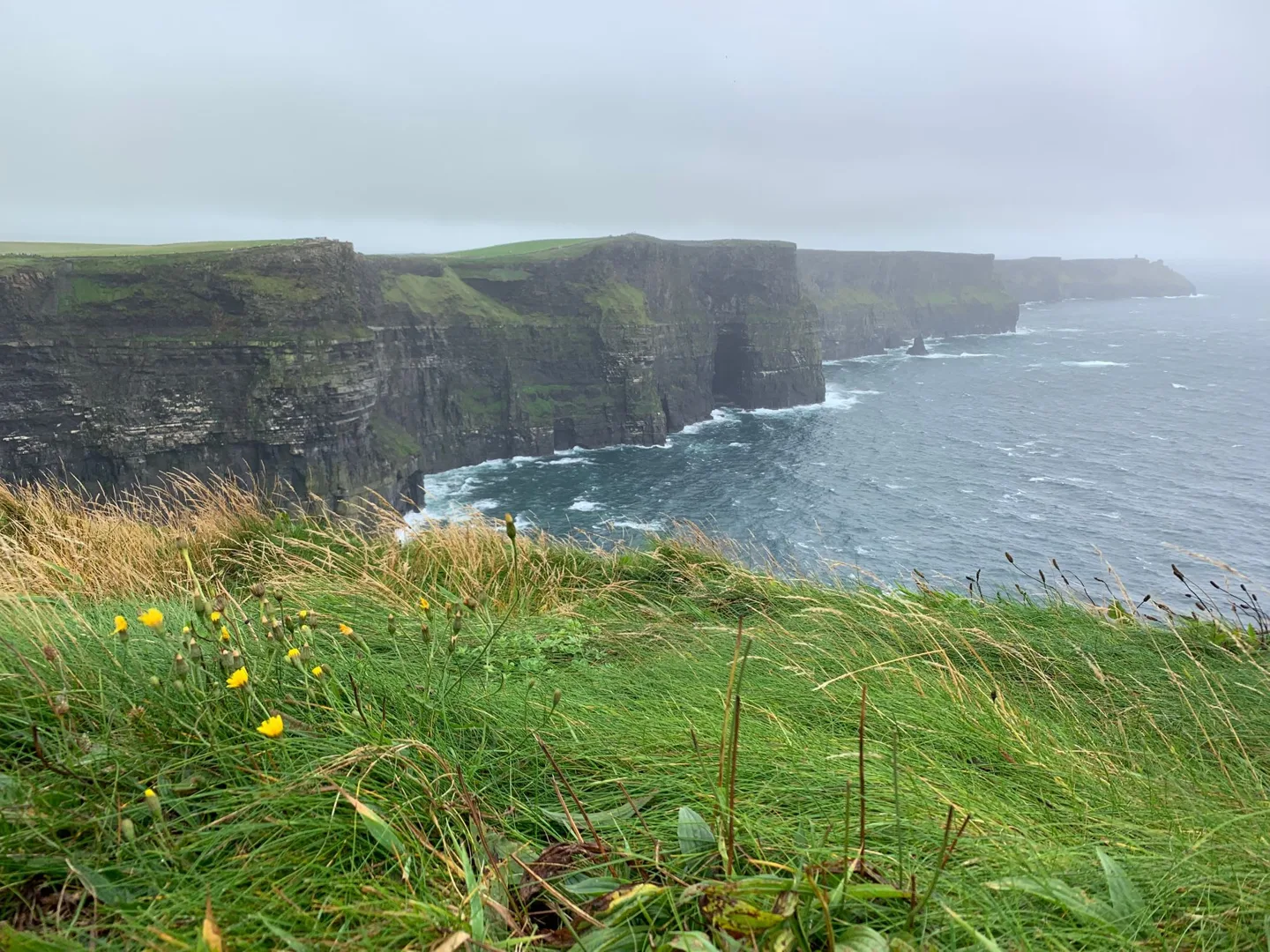 Cliffs of Moher receding along the coast