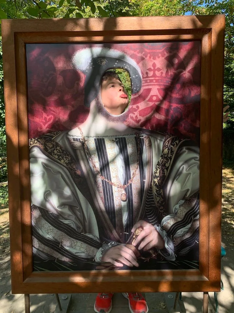 Child posing in a historical costume picture frame