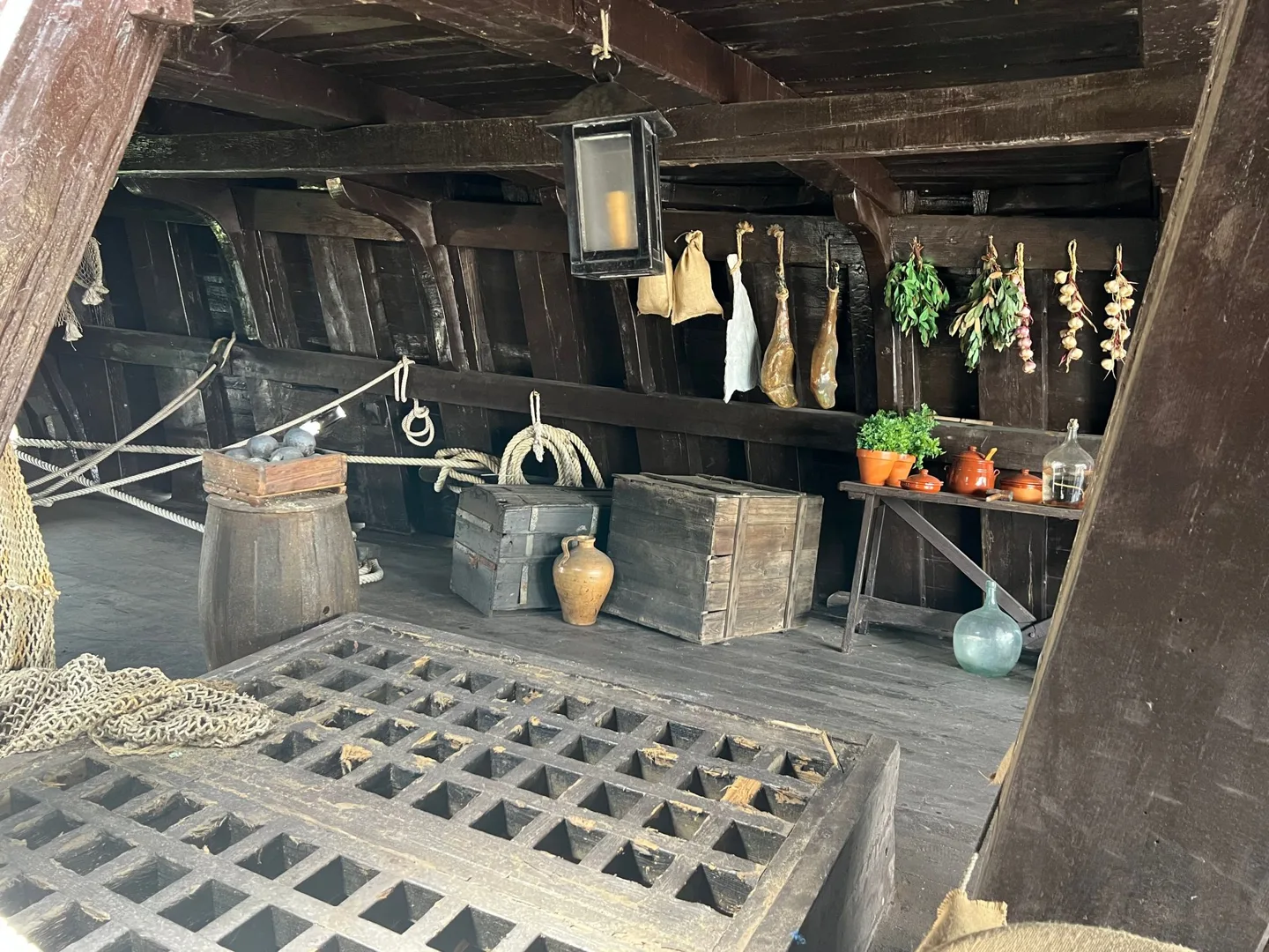 Recreated ship's kitchen with hanging provisions