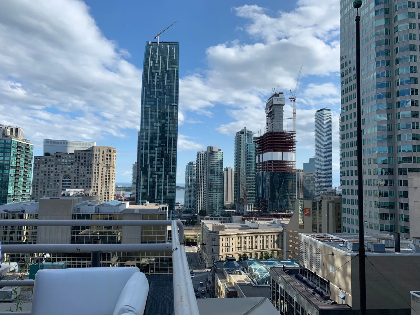 View across a city skyline from a rooftop