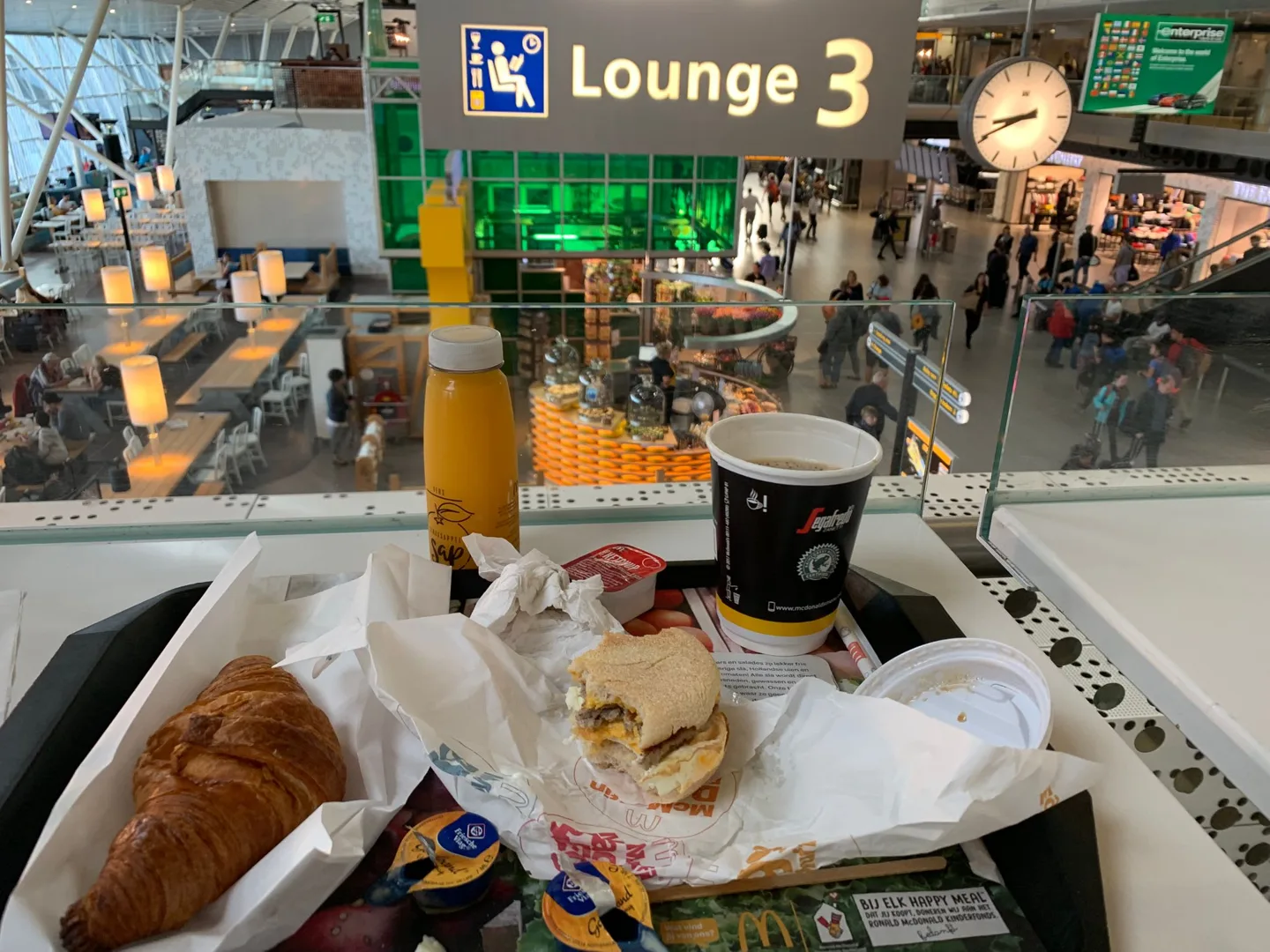 Drinks and snacks on an outdoor café table