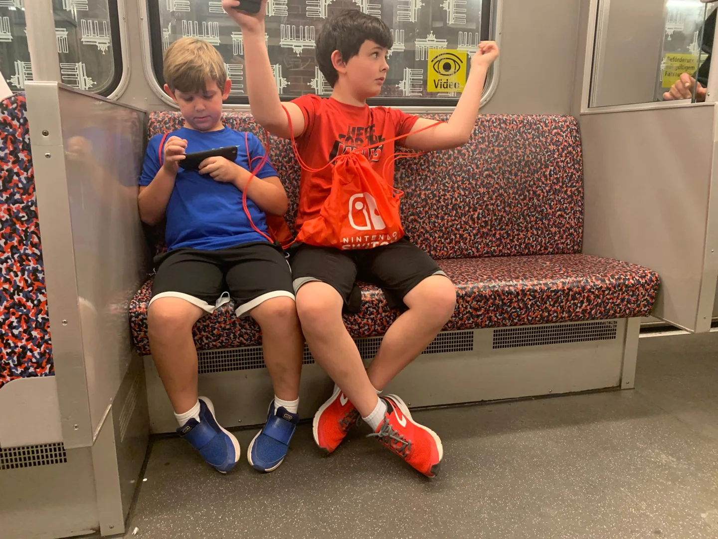 Children seated on a train