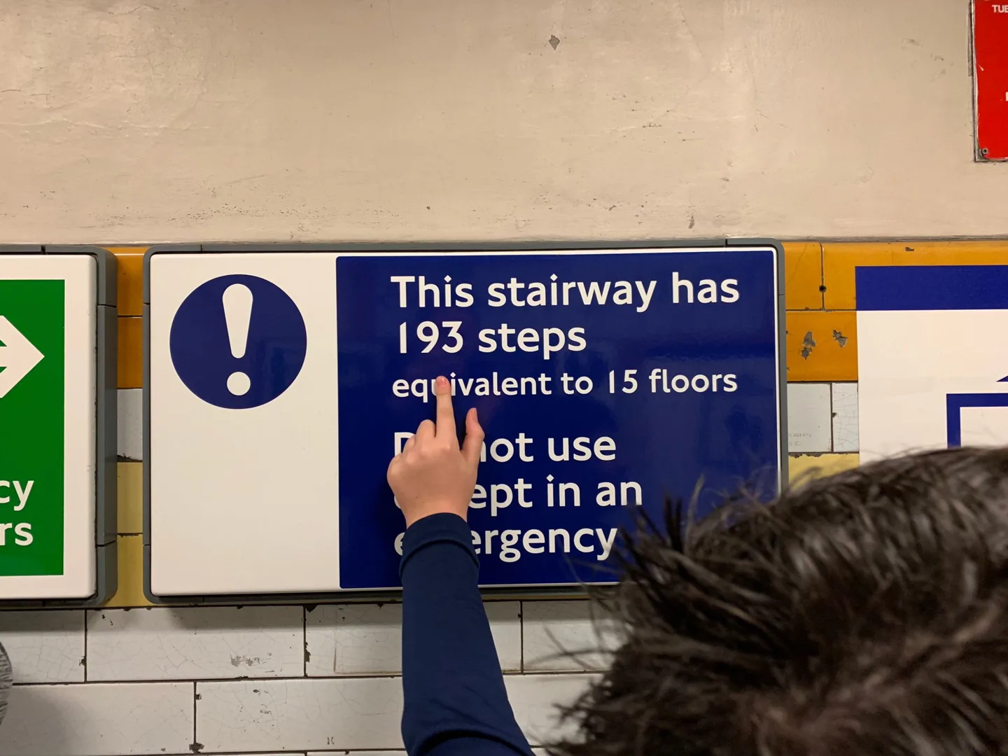 Sign warning of 193 steps in a stairway