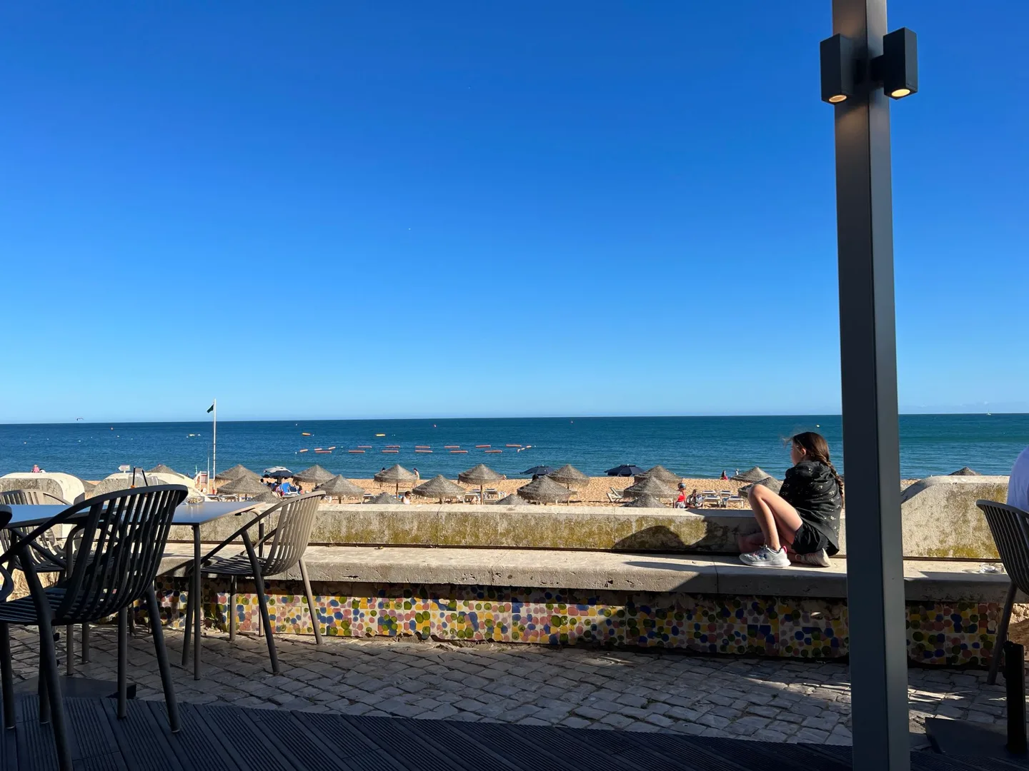 Outdoor tables overlooking the sea