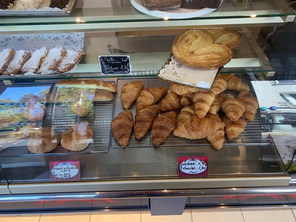Croissants and pastries in a bakery display