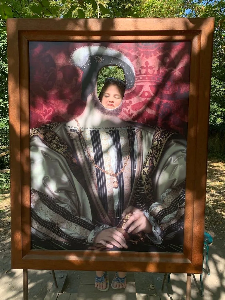 Child smiling in a historical costume picture frame