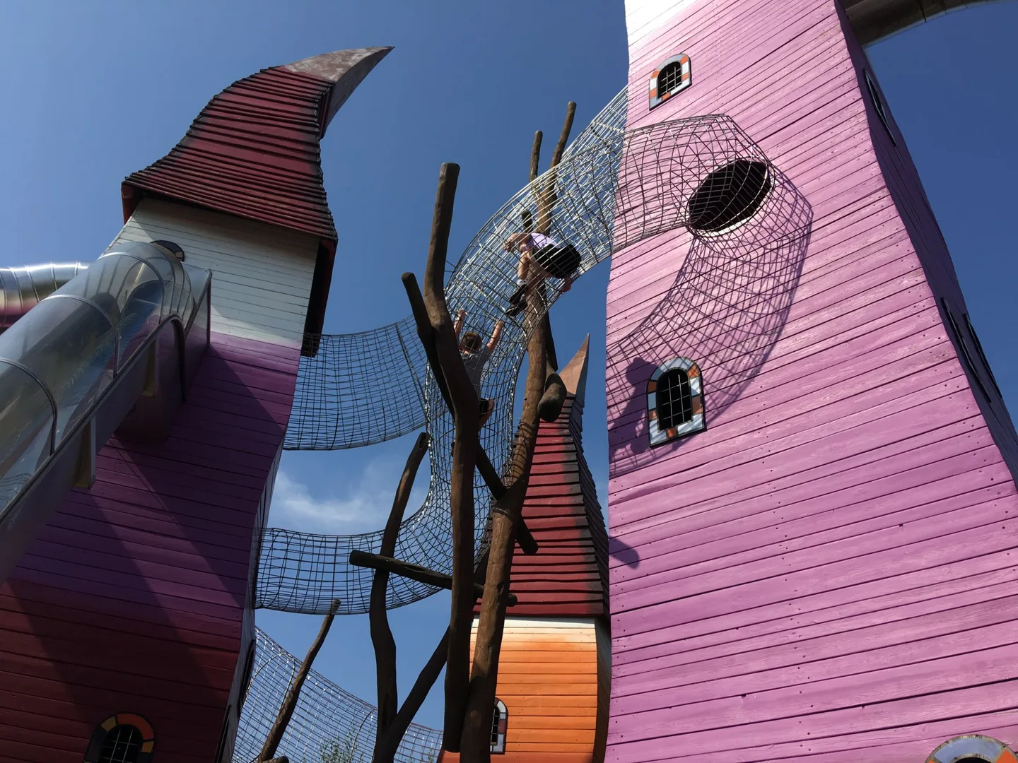 Colorful climbing towers viewed from below