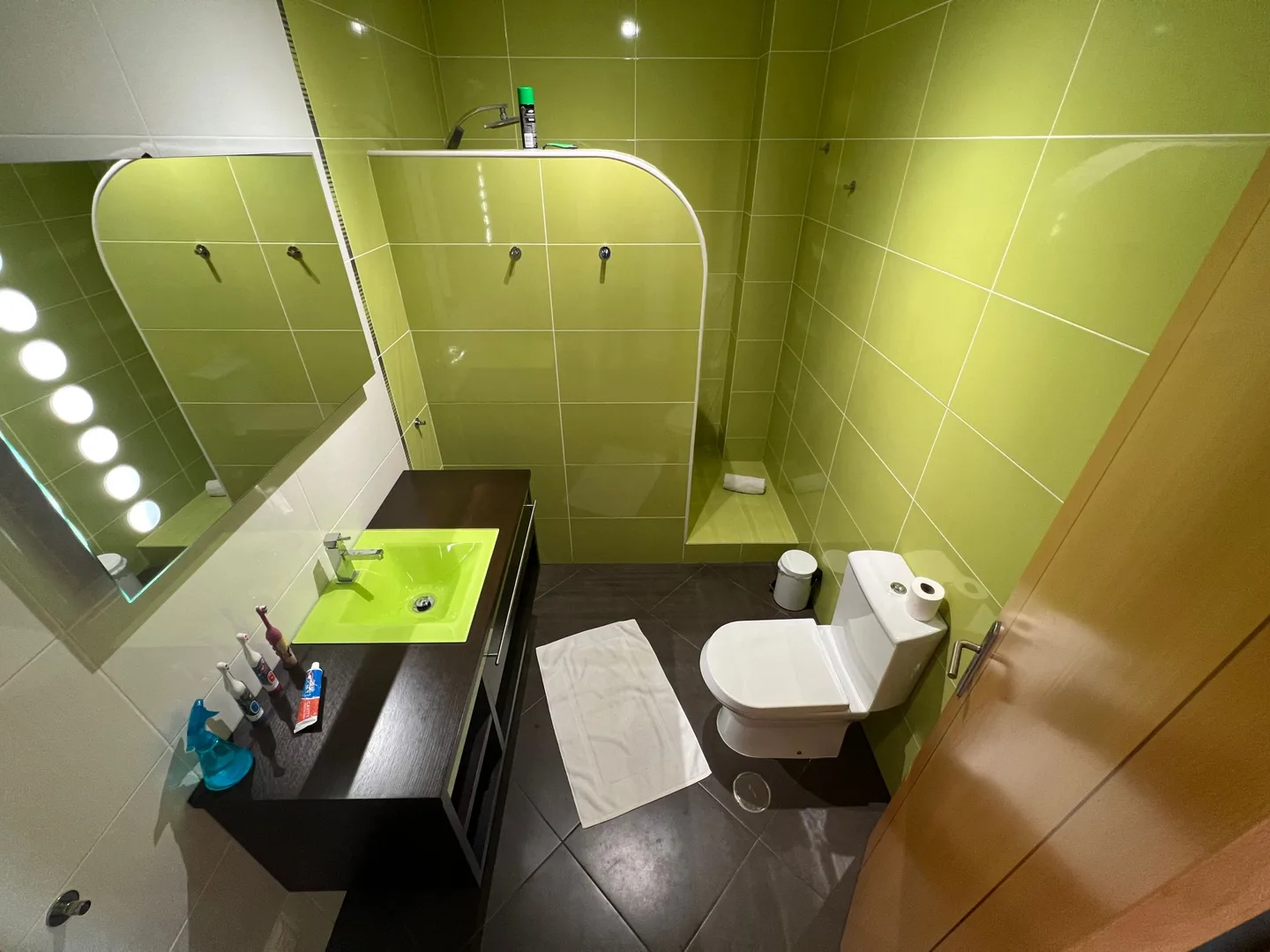 Green-tiled bathroom