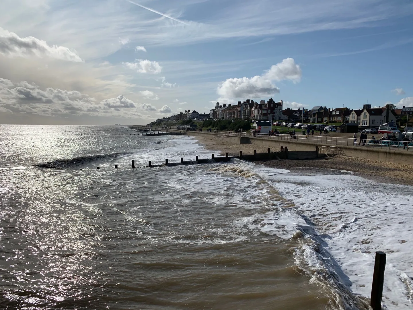Sunlight on waves by the seafront