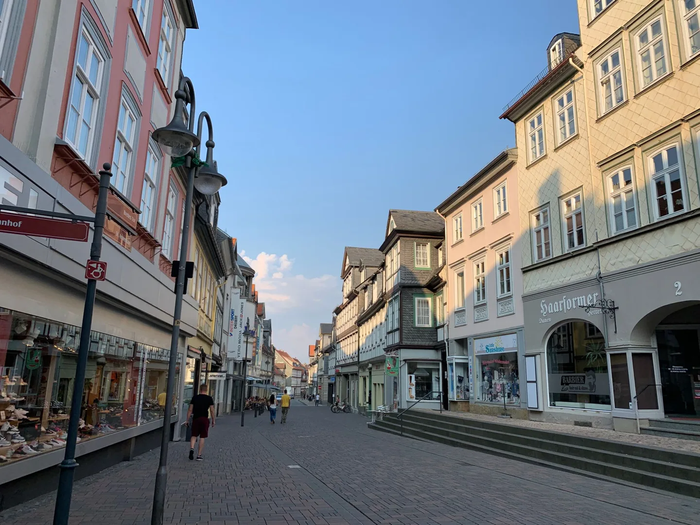 Pedestrian street lined with colorful façades