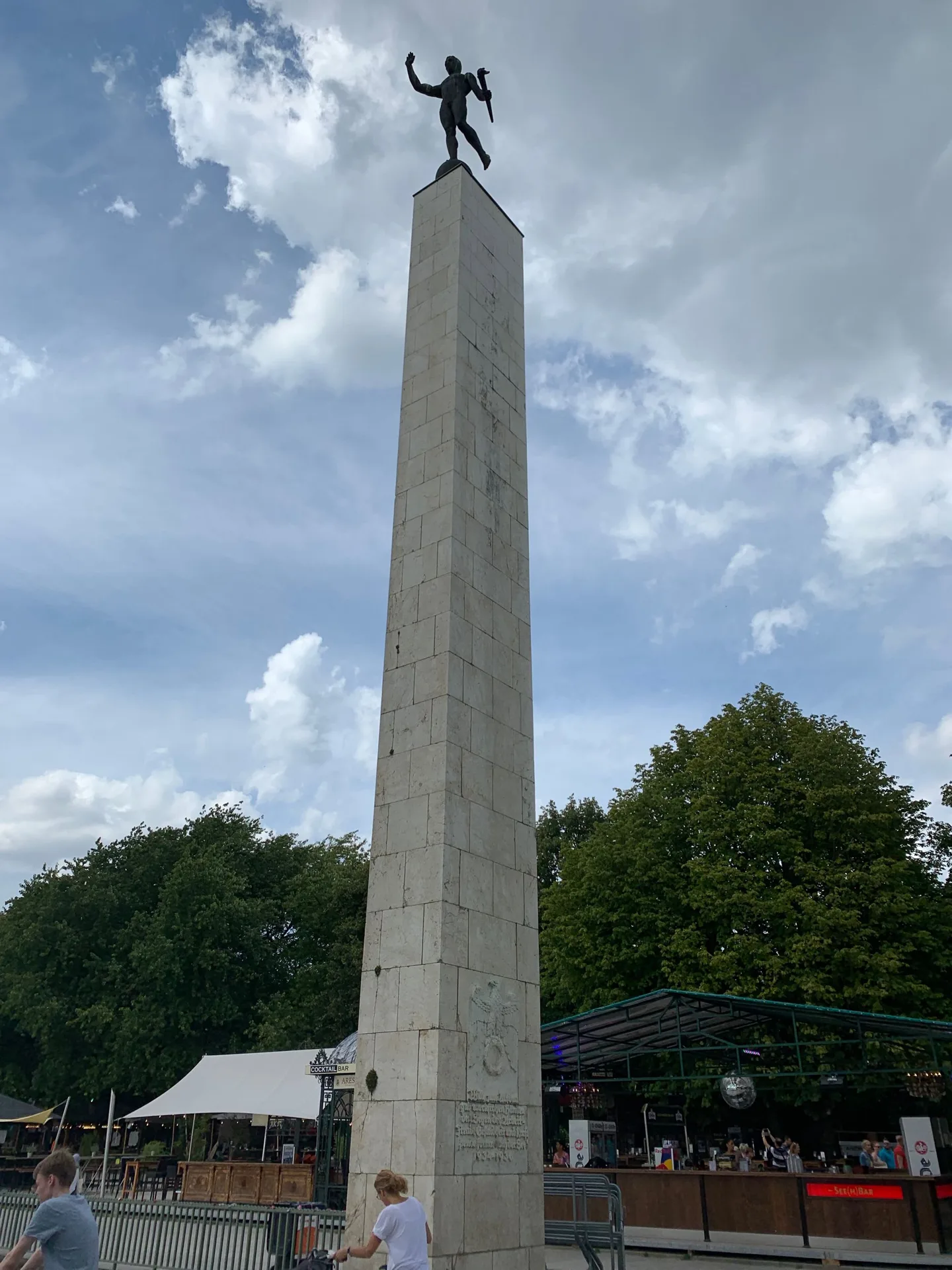 Tall column topped by a sculpture